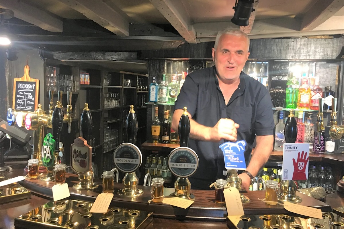 Wooden pub interior with warm lighting